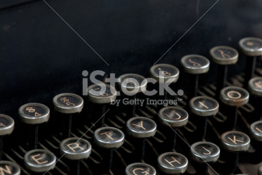 stock-photo-10075007-vintage-typewriter-keys-with-copy-space