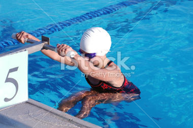 Swimmer starting the backstroke stock image