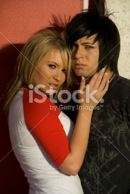Teenage couple embracing