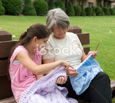 stock-photo-3719343-grandmother-teaching-her-grand-daughter-to-crochet