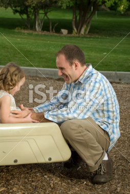 Father Playing with His Daughter