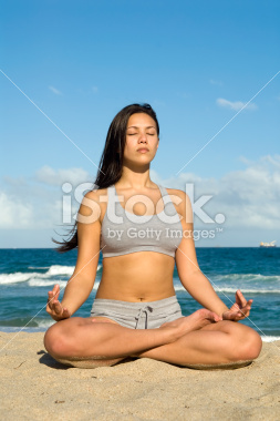 stock-photo-5546601-mediation-on-the-beach-yoga-lotus-position