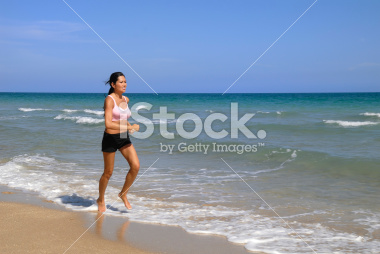 stock-photo-8730753-asian-fitness-model-running-on-the-beach