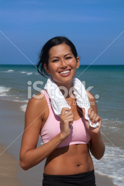 stock-photo-8875402-woman-exercising-on-the-beach